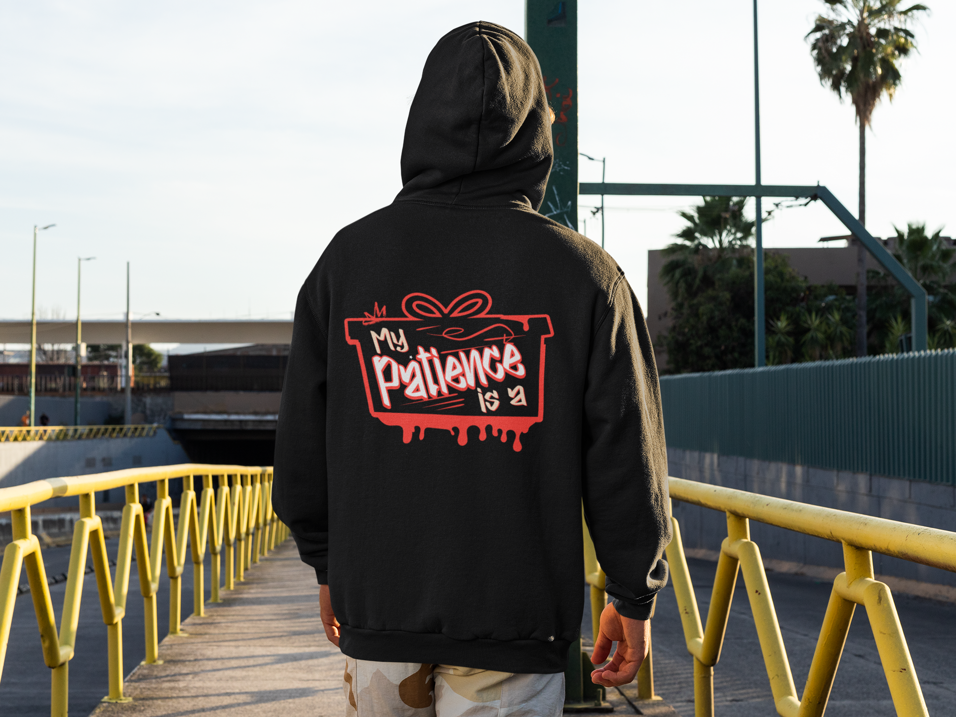 back-view-hoodie-mockup-of-a-man-standing-on-a-city-street-m523