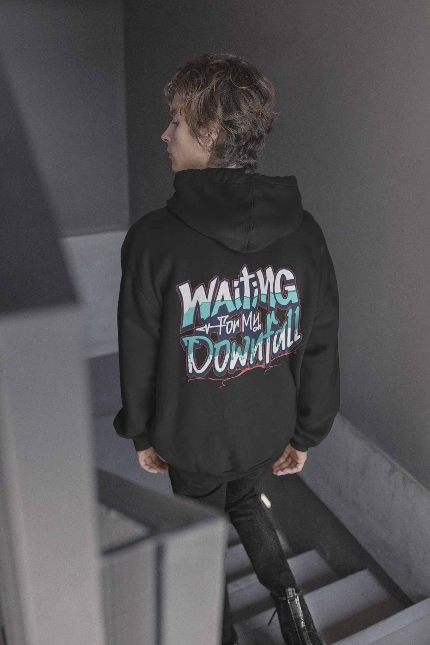 back-view-mockup-of-a-man-on-a-staircase-wearing-a-hoodie-with-customizable-sleeves-m19907 (1)