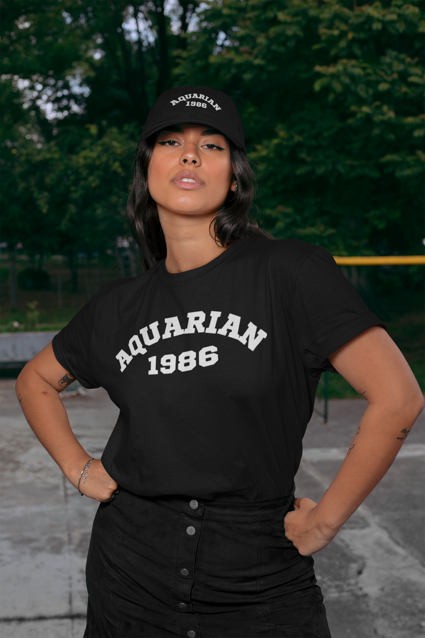 mockup-of-a-woman-wearing-a-t-shirt-and-a-dad-hat-at-a-park-28598