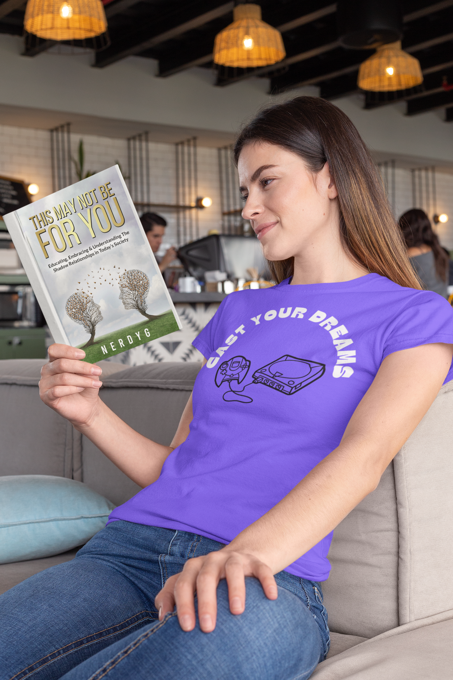 mockup-of-a-woman-wearing-a-t-shirt-and-reading-a-book-at-a-cafe-28480