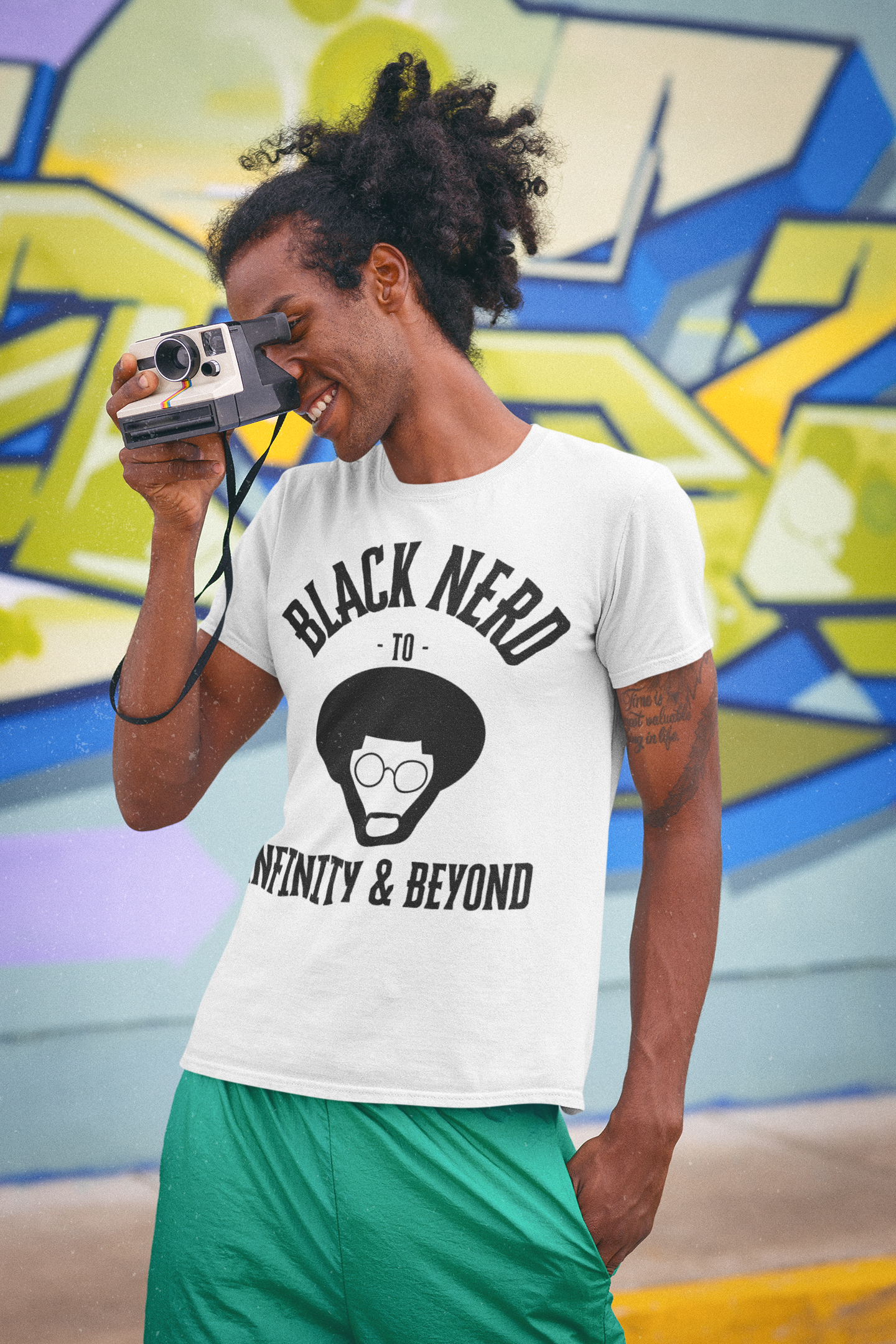 t-shirt-mockup-of-a-man-taking-a-picture-with-a-retro-camera-m11603