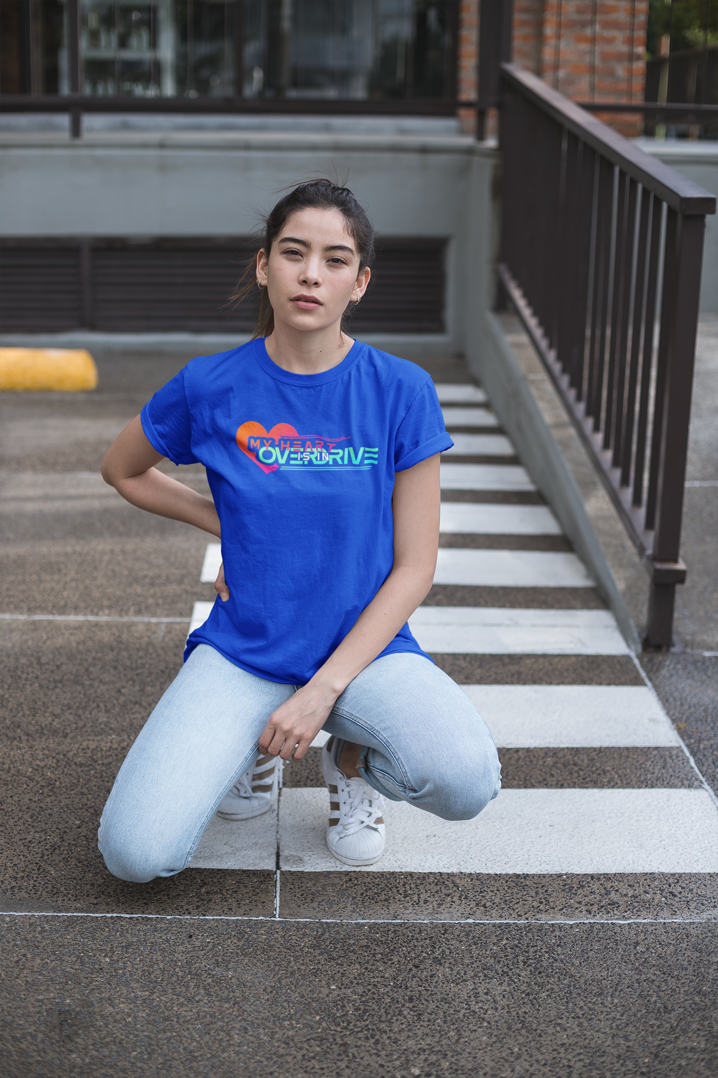 unisex-tee-mockup-of-a-woman-posing-in-a-parking-lot-23008